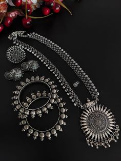 This minimalistic long oxidized necklace set is perfect for an Indian bride. Beautifully designed with German oxidized silver, this wedding set has a big intricate long Haram oxidized necklace, a pair of jhumki earrings, a ring, a pair of bangles, and a nose pin. This bridal oxidized set is available in six different patterns and sizes. Each of these pieces will work wonderfully on its own and even more elegant when worn together. You can also style them with your Navratri outfit or any ethnic o Chandbali Oxidized Wedding Jewelry Sets, Wedding Chandbali Jewelry Sets With Oxidized Finish, Wedding Chandbali Oxidized Jewelry Sets, Antique Silver Oxidized Wedding Jewelry, Temple Jewelry Sets With Oxidized Finish For Wedding, Festive Oxidized Finish Bridal Necklace, Festive Oxidized Bridal Necklace, Temple Jewelry Bridal Necklace With Oxidized Finish, Classic Silver Jewelry