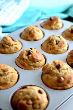 a muffin tin filled with chocolate chip cookies