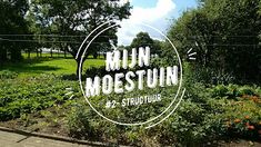 there is a sign that says mun mogestuin in front of some flowers