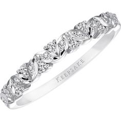 a white gold wedding band with diamonds