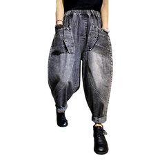 Step into 2023 with our vintage grey baggy denim pants. from the Autumn Collection. With a high-waist and rubber closure. these fashion-forward trousers are perfect for any occasion. Whether you're out for brunch or at a night out. they'll give you that extra touch of stylishness.Distinctive Features: Vintage Aesthetic: Our baggy denim pants merge vintage allure with the latest fashion trends. Baggy Fit: Whether you're out for a walk or dancing the night away. their loose fit will keep you comfo Baggy Wide Leg Gray Cargo Jeans, Gray High Waist Cargo Jeans For Streetwear, High Waist Gray Cargo Jeans For Streetwear, High Waisted Gray Cargo Jeans For Streetwear, Trendy Washed Black Tapered Leg Jeans, Trendy Washed Black Tapered Jeans, Gray Baggy Straight Leg Bottoms, Gray Baggy High Waist Cargo Jeans, Gray Baggy Straight Leg Cargo Jeans