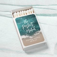 matchbox with matches on the beach and the words, the perfect match written in white