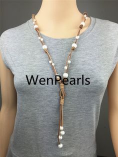 "NOTE: the length of necklace not include drop part NOTE: Each baroque pearl shape is different Necklace is 10'' to 29'' long, intended to be worn as a choker. Leather is 2 mm thick. Pearl size is 12mm and 7mm Back to Other Jewelry Section 01: \"Flameball Pearl\" Section： https://www.etsy.com/shop/WenPearls?section_id=22535705 02: \"Edison Pearl\" Section: https://www.etsy.com/shop/WenPearls?section_id=18890242 03: \"Keshi Pearl\" Section: https://www.etsy.com/shop/WenPearls?section_id=22535725 White Adjustable Lariat Necklace With Pearl Charm, White Adjustable Lariat Necklace With Pearl Pendant, Adjustable White Lariat Necklace With Pearl Pendant, Pearl Leather Necklace, Leather Pearl Necklace, Necklace Leather, Pearl Leather, Necklace Pearl, Necklace White