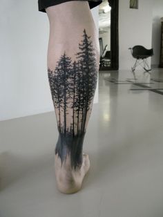 the legs are painted with trees on them