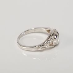 "Thanks for shopping our vintage estate store. We tend to sell well below wholesale and truly hope you enjoy all of our items. Many of the items are one of a kind, so please enjoy scrolling through the pictures and hopefully something will catch your eye. Brown spots are from camera. Estate Sterling Silver 925 created heart cz diamond baby or midi ring. This is a custom made item from our shop, meaning we set the gem into the setting. Ring size: please select Setting: 1/4\" 4mm Band width: 1.5mm Classic Silver Heart-shaped Ring, Classic Silver Heart Shaped Ring, Classic Silver Heart Ring With Polished Finish, Classic Sterling Silver Birthstone Diamond Ring, Classic Sterling Silver Diamond Ring With Birthstone, Classic Oval Heart Ring, Classic Heart Ring With Center Stone For Promise, Classic Oval Heart Promise Ring, Silver Heart Ring With Halo Setting For Formal Occasions