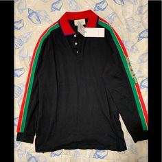 New With Tags. Retail $980. Authentic Gucci Polo With Stripe. Size Large Black Gucci Collared Top, Black Collared Gucci Top, Gucci Black Collared Top, Classic Long Sleeve Gucci Top, Gucci Polo Shirt Men, Gucci Polo Shirt, Gucci Shirts, White Polo, Cotton Polo