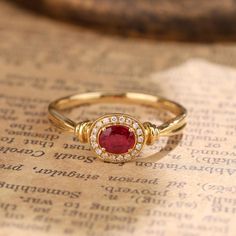 Material： 14k or 18k filled Gold Ruby Diamond or Lab stones Description 18k or 14k filled gold Oval ruby Ring, 18k or 14k filled gold natural ruby Ring, Promise Ring, Minimal Dainty Ring for Women Elegant and timeless, our 18k gold natural ruby ring is the epitome of Minimal Dainty Ring for Women. Perfect for everyday wear, this delicate piece adds a touch of sophistication to any look. Gift her the essence of understated luxury this season. - Metal: 18K or 14k filled Yellow Gold - Custom Color: Rose Gold, Yellow Gold, and White Gold - Gross weight: 2.32g - Gold Weight: 2.25g - Gemstones: Ruby, Diamond or Lab stones - Ruby CTW: 0.31(1 pc) - Diamond CTW: 0.042(18 pcs) *production time is about 2-3 weeks from the day the order is in. Heirloom Style Lab-created Ruby Diamond Ring As Gift, Heirloom Style Lab-created Ruby Diamond Ring Gift, Oval Lab-created Ruby Diamond Ring In Fine Jewelry Style, Oval Lab-created Ruby Diamond Ring, Heirloom Ruby Ring In Yellow Gold With Halo Design, Heirloom Yellow Gold Ruby Ring With Halo Design, Luxury Oval Rings With Rose Cut Diamonds And Ruby, Oval Ruby Diamond Ring For Anniversary, Oval Ruby Birthstone Ring With Halo Setting