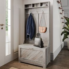 an entryway with a bench, coat rack and handbag