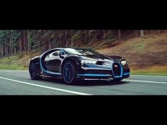 the bugatti is driving down the road