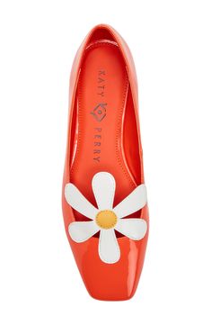 A whimsical daisy appliqué enriches the instep of a glossy flat fashioned with a square toe for contemporary appeal. Synthetic upper/synthetic and textile lining/synthetic sole Imported Summer Patent Leather Flats With Low Heel, Trendy Fitted Flats For Spring, Summer Patent Leather Flats, Fitted Synthetic Flats For Spring, Spring Patent Leather Flats With Low Heel, Spring Square Toe Fitted Flats, Spring Casual Patent Leather Flats, Trendy Square Toe Flats For Spring, Casual Patent Leather Flats For Spring