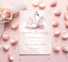 a pink birthday card with a swan on it and roses around the edges that says our little princess is turning one