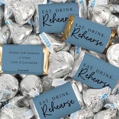 hersheys wrapped in blue and silver foil with the words eat drink behance on them