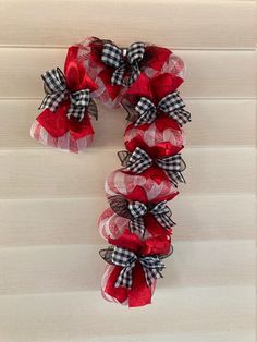 a number made out of red and black bows