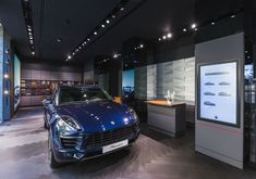 a car is on display in a showroom