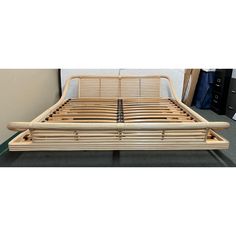 the bed frame is made out of bamboo