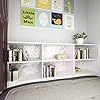 a bedroom with a bed, shelves and pictures on the wall