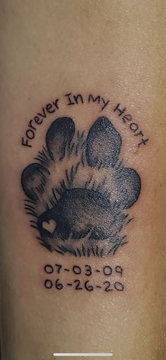 a dog paw with the words forever in my heart written on it's side