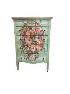 an old dresser with flowers painted on it