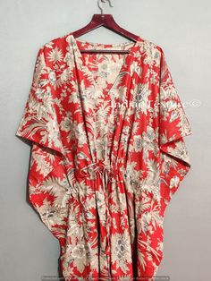 "This Beautiful Indian Cotton Caftan Or Can Be Called As Tunic Is Made With Super Fine Quality Cotton And Designs Have Been Crafted By Hand Prints. Measurements :- Size - Free Size Length -138 Cm / 54 Inches Bust/Chest Size - 87 CM/ 34 Inches Fabric - 100% Cotton Pattern - Floral Kaftan Has Adjustable Drawstring Waist To Loose Or Tight , Kaftan Has V Shape Neck Which Is 8\" Inches Deep. Kaftan Is Multi-Purpose And Can Be Worn As A Cover Up At The Beach ,Lounge Wear ,Sleepwear ,Pregnant Women Hos Red Kimono Sleeve Beach Dress, Red Beachwear Dress With Kimono Sleeves, Red Printed Beachwear Kaftan, Red Printed Kaftan For Beachwear, Red V-neck Tunic For Vacation, Red Floral Print Kaftan For Vacation, Traditional Floral Print Beach Tunic, Traditional Beach Tunic With Floral Print, Red Summer Tunic For Vacation