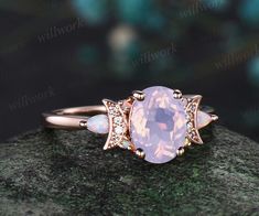 - Metal: Solid gold(10K/14K/18K white/yellow/rose gold),925 sterling silver,platinum available- Main Stone: 6x8mm oval cut Lavender Amethyst- Accent Stone: 2x4mm pear lab opals, round moissanites and round opals- Can be personalized: Yes Elegant 14k Gold Crescent Ring, Elegant White Crescent Rings, Elegant Crescent Ring For Anniversary, Elegant Crescent Shaped Rings For Anniversary, Dainty Crescent Wedding Rings, Rose Gold Crescent Wedding Ring, Elegant Crescent Gemstone Ring, Retro Moon, Amethyst Engagement Ring