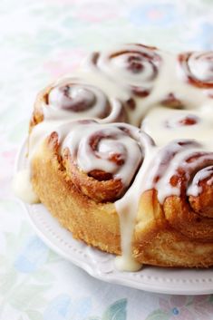 a bundt cake with icing on a plate