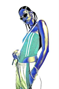 a woman with blue paint on her body and sunglasses