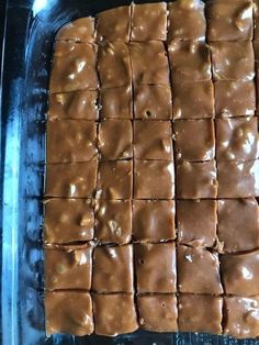 a pan filled with brownies sitting on top of a counter next to an instagram post