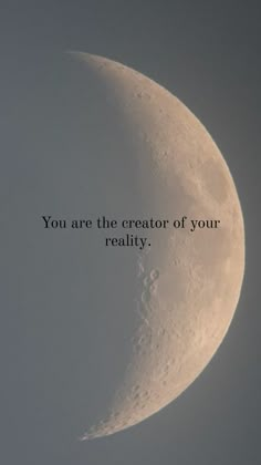 a half moon with the words you are the creator of your reality