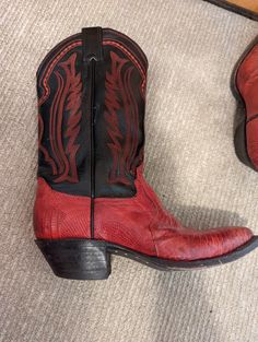 Justin's women’s black and red, leather cowboy boots. Good condition, size 6 and 6.5. Detailed measurements: Length Of Sole - 11 inches Heel Height - 2 inches Boot Height - 11 inches Western Red Leather Moto Boots, Western Style Red Leather Moto Boots, Red Western Boots With Round Toe, Red Leather Boots For Ranch, Red Fitted Boots For Rodeo, Fitted Red Boots For Rodeo, Western Red Snip Toe Boots, Western Red Boots With Snip Toe, Red Snip Toe Boots For Western-themed Events