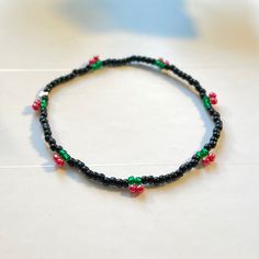 bracelet, bracelets, jewelry, jewellery, pink, black, white, cream, etsy, cute, dainty, kawaii, dainty jewelry, beaded bracelet, beaded bracelets, gift ideas, gift, gifts, gift for her, gifts for her, gift for girlfriend, girl, girly, girls, fashion, accessories, women, feminine, female, cherry, cherries, cherry bracelet, gold jewelry, silver jewelry, stainless steel, gold, silver, flower, flowers, crystals, silver jewelry, gold jewelry, seed beads, grass, daisies Casual Black Beads Stretch Bracelet Gift, Casual Black Beads Stretch Bracelet, Casual Beaded Bracelets With Black Beads As Gift, Flexible Jewelry With Colorful Beads For Gifts, Flexible Colorful Beaded Jewelry For Gifts, Flexible Bracelets With Tiny Beads As A Gift, Dainty Hand-strung Beads For Gifts, Casual Flexible Jewelry As Gift, Dainty Black Beaded Bracelets For Gift