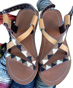 Multicolor Open Toe Slingback Sandals For Beach, Beaded Open Toe Sandals For Vacation, Handmade Open Toe Sandals For Beach Season, Handmade Ankle Strap Sandals For Beach Season, Beaded T-strap Sandals For Vacation, Brown Beaded Sandals For The Beach, Brown Sandals For Beach Festivals, Brown Sandals For Vacation And Festivals, Open Toe Sandals For Festivals