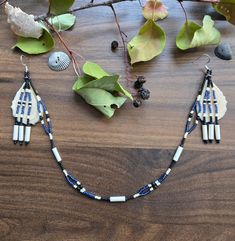 These jewelry sets are inspired by my very own culture🖤 Yup'ik Alaska Inuit agluirutet, a 2-in-1 Inuit style attached necklace+earrings set. This set can be worn with or without the chin decoration! Hung from silver toned hypoallergenic hooks, this is made with caribou antler slices that my Apa (grandfather) had at fishcamp, family treasures. With antique bone tube beads and blue, black and antique white beadwork Artisan Black Beads Dangle Jewelry, Artisan Black Bead Dangle Jewelry, Artisan Black Beaded Dangle Jewelry, Traditional Dangle Black Bead Jewelry, Southwestern Style Black Beads Jewelry For Gift, Artisan Jewelry With Black Beads, Southwestern Style Black Bead Jewelry For Gifts, Southwestern Style Jewelry With Black Beads For Gift, Traditional Black Beads Jewelry For Crafting