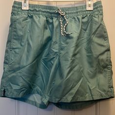 Goodfellow & Co Teal Swim Shorts. Size Medium. The Inside Netting Has Been Removed But The Pocket Netting Remains. Otherwise I’m Good Condition. No Discoloration And Never Worn In The Water. Green Vacation Bottoms With Drawstring, Green Drawstring Short Swim Trunks, Green Drawstring Vacation Bottoms, Green Drawstring Swim Trunks, Green Drawstring Bottoms For Vacation, Green Swim Trunks With Pockets Relaxed Fit, Green Swim Trunks With Pockets And Relaxed Fit, Green Drawstring Swim Trunks Short Length, Summer Bottoms In Relaxed Fit Green