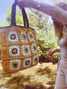 Cute BAG! It evokes the warmth and richness of earth brown colors while also highlighting the versatility of the bag as a functional accessory. ------------------------------------------------ My dear customers, this type of bag is one I often use a lot, even for my walks. Despite its strong crochet structure (the square), it's a lightweight bag.  "Crafted with care, the Terracotta Tote, In earthy hues, it effortlessly floats. A blend of style and practicality, it brings, Nature's embrace in every stitch it sings." Bag size (only the squared zone) 15x14 inches Size up/down with handles included: 21 inches Material: Cotton  THIS listing is for the DIGITAL Pattern Only!  Thank you Brown Square Bag With Handles, Brown Crochet Shopping Bag With Removable Pouch, Brown Crochet Travel Bag With Double Handle, Brown Handheld Crochet Bag For Shopping, Bohemian Brown Square Shoulder Bag, Brown Square Crochet Bag For Shopping, Square Brown Crochet Shopping Bag, Brown Square Crochet Shopping Bag, Everyday Brown Crochet Bag With Handles