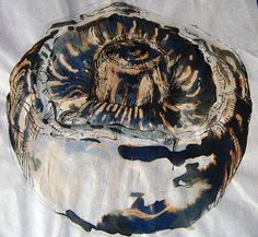 a painting of an animal in a bowl on a white tablecloth with blue and brown designs