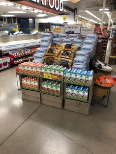 the inside of a grocery store filled with lots of food