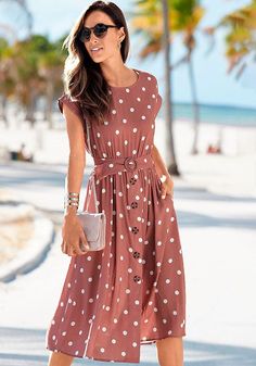 Go for a timeless look in this adorable polka dot midi dress. Summer Midi Dress In Polka Dot, Spring Polka Dot Midi Dress, Polka Dot Spring Midi Dress, Summer Midi Length Polka Dot Dress, Polka Dot Midi Dress For Spring, Casual Polka Dot Midi Dress For Day Out, Knee-length Polka Dot Dress For Day Out, Polka Dot Knee-length Dress For Day Out, Polka Dot Knee-length Midi Dress For Spring