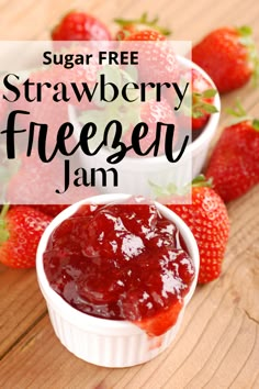 strawberry freezer jam in small white bowls with strawberries on the side and text overlay