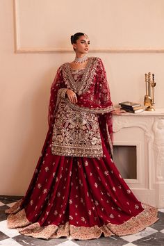 Pakistani Bridal Dress in Red Sharara Kameez Style is an epitome of tradition and royalty. Hand-crafted embellishments and perfect stitching according to customer's demands make this Pakistani Wedding Dress an epitome of beauty and your foremost priority for the big day. Bridal Kameez: The kameez in an alluring red shade is a perfect attire to wear on the big day. Hand-crafted details of zardosi, stones, pearls, motifs,, naqshi, shimmering details, and embroidery give a traditional touch to this Bridal Sharara Pakistani, Kameez Style, Red Sharara, Bridal Sharara, Princess Ballgown, Bridal Suits, Pakistani Bridal Dress, Bridal Dupatta, Desi Wedding Dresses