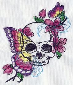 a skull with flowers on its head and a butterfly in the middle of it's face