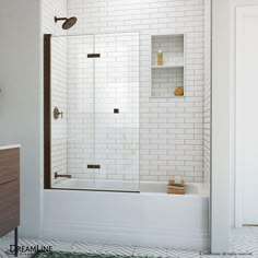 a bathroom with a white tiled wall and floor, including a bathtub in the corner