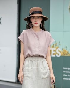 "The blouse of beautiful cut in pink linen. Our pink linen shirt, loose, comfortable and versatile. It is practical enough to tuck into your favorite shirt. It is soft, comfortable & pleasant to wear. You can wear it all the time, can also pair with jeans, skirts, etc. It will make any thing you wear look polished. Yes, it is a good choice for women tops and Mothers' Day gift. Why Good selection with linen shirt? The main benefit of wearing linen clothes in hot weather is the coolness they provi Casual Pink Linen Blouse, Pink Linen Blouse For Summer, Pink Linen Shirt, Linen Shirt Women, Linen Tops, Linen Shirts Women, Shirt Linen, Pink Linen, Linen Blouse