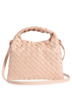 This slightly slouchy hobo bag in a scaled-down silhouette for just the essentials is handwoven in the label's iconic Intrecciato style from soft calfskin. Magnetic closure Top carry handle; removable, adjustable crossbody strap Interior zip pocket Calfskin-leather lining Leather Made in Italy Designer Handbags Chic Bucket Bag With Woven Leather And Round Handle, Chic Shoulder Bag With Woven Leather And Round Handle, Chic Woven Leather Bucket Bag With Round Handle, Top Handle Woven Leather Hobo Bag For Errands, Woven Leather Top Handle Hobo Bag For Errands, Shopping Woven Leather Hobo Bag With Top Handle, Everyday Top Handle Hobo Bag With Intrecciato Weave, Chic Hobo Bag With Intrecciato Weave For Shopping, Shopping Crossbody Hobo Bag With Braided Handles