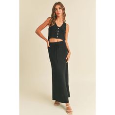 Combine comfort and style with our Karlee Vest and Maxi Skirt set in a chic black color. This versatile set is perfect for any occasion, providing you with a stylish and effortless look. Made with high-quality materials, you'll feel comfortable and confident all day long. SOLD SEPARATELY Runs true to size Model is wearing a size small Trendy Black Vacation Sets, Casual Maxi Skirt For Loungewear, Sleeveless Black Sets For Spring, Fitted Black Maxi Skirt Casual, Fitted Black Casual Maxi Skirt, Black Fitted Maxi Skirt Casual, Black Fitted Casual Maxi Skirt, Elegant Black Maxi Skirt For Day Out, Casual Two-piece Maxi Skirt For Vacation