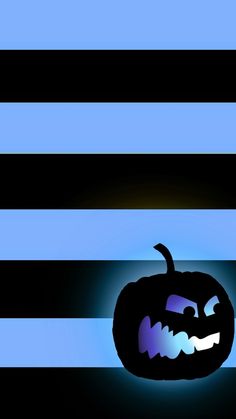 a black and blue striped background with a pumpkin