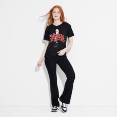 Take your casual style up a notch with this Women's Sabrina Carpenter Short Sleeve Graphic T-Shirt – Black. With Sabrina Carpenter graphics on the front, this tee gives a laid-back vibe. It is made from lightweight and breathable fabric that feels comfortable against your skin. Wear this women’s t-shirt with your favorite pair of jeans for a perfectly relaxed look. Stretch Graphic Print Top Band Merch, Stretch Graphic Print Band Merch Tops, Stretch Graphic Print Tops For Band Merch, Stretch Top With Graphic Print Band Merch, Edgy Fitted T-shirt For Fall, Stretch Tops With Graphic Print For Band Merch, Edgy Fitted Fall T-shirt, Edgy Short Sleeve Stretch T-shirt, Edgy Stretch Short Sleeve T-shirt