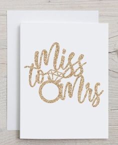 a card with the words miss to mrs written in gold glitter on it, against a white background