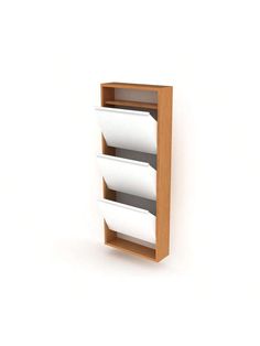 a wooden shelf with three white papers on it