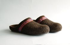 These felted slippers are made using all natural products -wool, hot water and olive oil soap. They are soft and so light that you feel as if you were barefoot. wool breathes so your feet will not sweat in them. Soles are made from natural rubber to prevent them from slipping and make them more durable on any flooring. Choose the colour of the ribbon from the last photo. Wear felted footwear - the feet are warm, and the sheep are intact! - SIZE: this item is made to order. Write me, please, your Brown Wool Slippers With Round Toe, Comfortable Brown Wool Slippers, Brown Slip-on Felt Slippers, Cozy Brown Slippers With Rubber Sole, Brown Felt Slippers With Round Toe, Handmade Brown Closed Toe Slippers, Woman House, Felt Wool Slipper, Woman Slippers