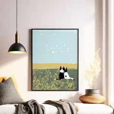 a black and white dog is flying in the air above a field with birds on it